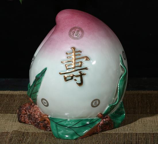 七旬匠心，桃韵永春——记国家级工艺美术大师刘远长的寿桃艺术